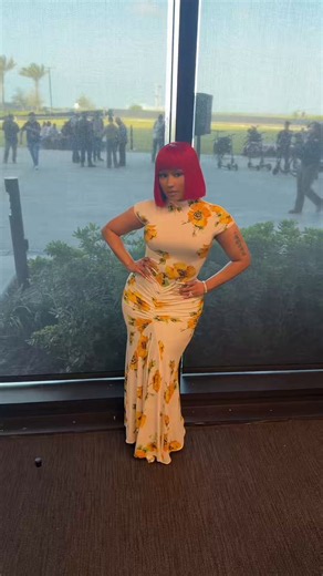 i do: the vibrant red bob perfectly complements the yellow floral dress with bold, eye-catching contrast and a chic edge, whereas black would look flat and blonde or any other color would feel washed-out and not deliver the same striking harmony.