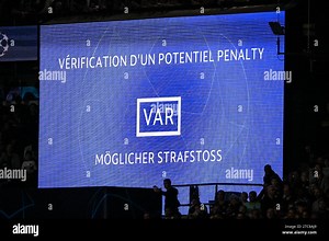 This photo shows the stadium's giant screen with the inscription "Checking a potential penalty" in consultation with the Video Assistant Referee (VAR) during the UEFA Champions League, Group F football match between Paris Saint Germain and Borussia Dortmund on September 19, 2023 at Parc des Princes stadium in Paris, France - Photo Matthieu Mirville / DPPI Stock Photo - Alamy