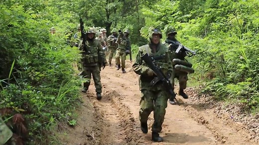 U.S. Army's 1st Battalion, 28th Infantry Regiment, Black Lions, 3rd Infantry Division stand ready