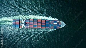 4K resolution high angle view of a container ship sailing at the sea for transportation.
