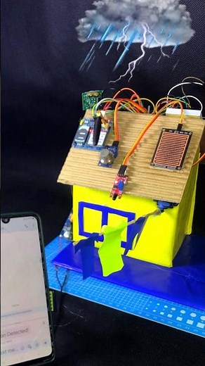 Rain is detected, and a servo motor automatically moves | Smart Home Alert #shorts