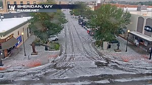That wasn't snow coming down in Sheridan, WY on Thursday! A severe storm produced up to 2 inch in diameter hail that coated the ground quickly, leading to this view from downtown! | WeatherNation