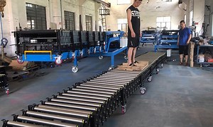 Extendable Powered Roller Conveyor With Side Guide Rollers | Yifan Conveyor