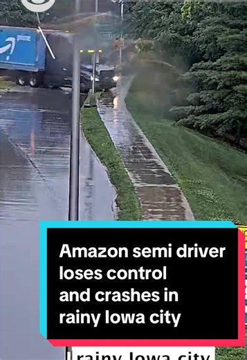 Dramatic traffic camera video released by authorities shows the moment the driver of an Amazon semi-truck lost control on a wet surface, veered off a road and crashed in Iowa City, Iowa, on Wednesday, June 25. The footage shows the semi-truck appearing to hydroplane as it came down Highway 6 onto Riverside Drive, close to the Iowa Avenue Bridge. The semi then crosses over opposing lanes of traffic, almost striking another vehicle, before barreling down off the side of the road.
