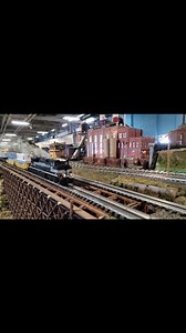 Santa Fe 4-8-4 #3751 and NYC SD70ACe #1066 rolling around the @thenjhirailers massive layout! #trains #fyp #hobby #modeltrains #lionel #MTH #steam #steamlocomotive #steamtrain #Diesel #santafe #nyc #freight #freighttrain #rr #city #scalemodel #modelrailway #diesellocomotive #trainspotting #railway #traintracks #station | BR Railroad