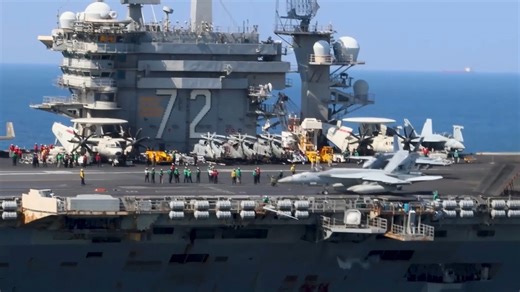 US fighter jets operating from a moving carrier in the Middle East