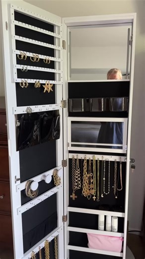 This mirrored jewelry armoire is doing the most 💁‍♀️💎 Full-length mirror on the front, 360° swivel base, locking storage, and surprise—shelves, an outlet, and hooks on the back for your bags, scarves & more. It’s like the closet upgrade you didn’t know you needed. ✨👜🔒 #JewelryArmoire #ClosetUpgrade #StorageGoals #MirrorCabinet #FunctionalFurniture #360Storage #HomeOrganization #VanityGoals #HiddenStorage #TikTokHome #OrganizationHack #FashionStorage #RoomGlowUp #JewelryStorage #SpaceSaver #A