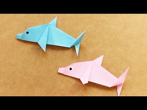 Easy folding of dolphins with origami. A popular sea fish in the aquarium made from one piece.