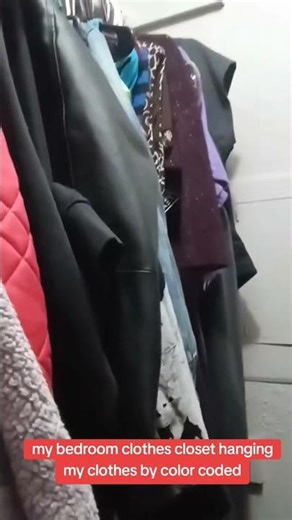 my bedroom clothes closet hanging my clothes by color coded