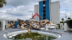 Demolition begins on last building to be removed for new Brooks Bridge