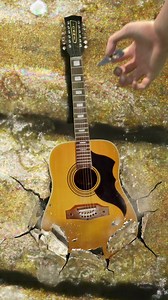 The infinite guitar loop 🎸 Have you ever seen a guitar string this close? At 50x magnification, sound becomes texture. The loop closes… by breaking the string with another guitar. Enjoy the infinite. #loop #guitar #macro #superzoom #infinite