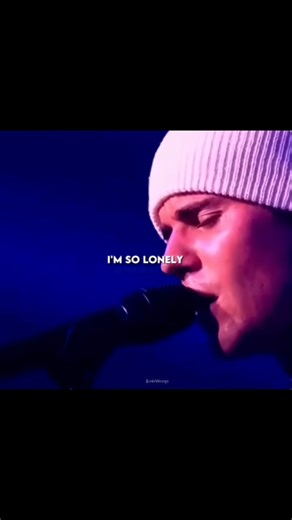 univhitsongs on Instagram: "Justin Bieber performed Lonely live at the Capital Jingle Bell Bal in 2021, delivering the song in a stripped-down setting with piano accompaniment.🎵🎤 The performance focused on the song's themes of isolation and the pressure of fame at a young age, with Bieber standing mostly still and letting the Iyrics carry the moment. His live rendition was noted for its emotional restraint and vulnerability, making it one of the more intimate performances of the event, Lonely.