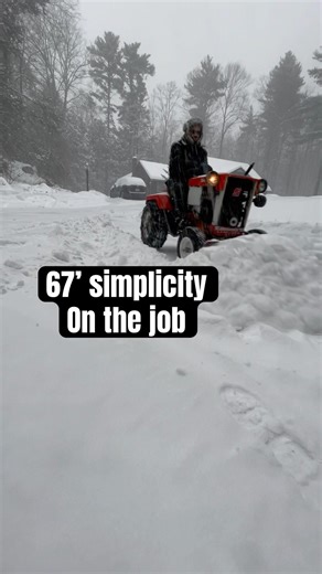 Old lawn and garden tractor plowing in New England storm #gardentractor