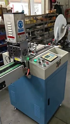 YS-6300 ultrasonic piece cutting and creasing machine for printed clothing fabric satin label ribbon