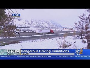 Cajon Pass Drivers Contend With Snow, Ice
