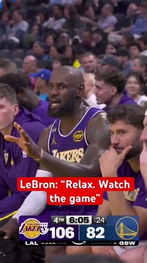 #LeBron tells a #Warriors fan to relax and watch the game.