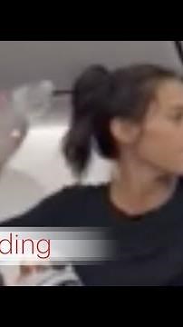 Woman swears at flight crew, throws bottle at passenger