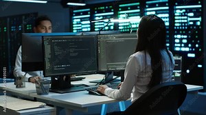 Engineer using augmented reality tech in data center, installing software, troubleshooting issues. IT expert in server hub looks at AR hologram, establishing performance benchmarks, camera A