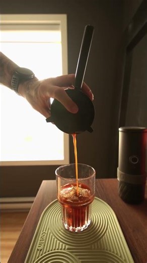 OutIn Brew Lab | Iced espresso topped with strawberry cold foam