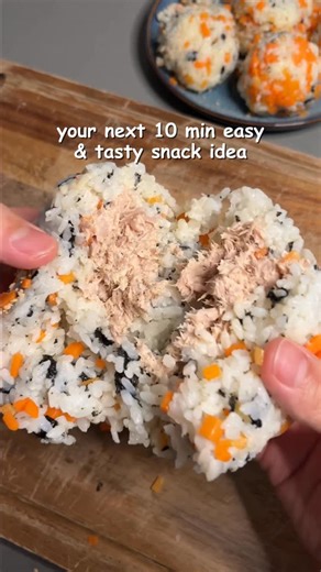 John K. on Instagram: "Make korean rice balls at home! How to make Jumeok Bap with Tuna (Korean Rice Balls) *not including rice cooking time 😝 1. Mix 1 can drained tuna, 1 tbsp kewpie mayo, and salt & pepper into a small bowl 2. Combine carrots, white rice (I used medium grain rice), 1 tsp sesame oil, salt, and nori into a medium bowl 3. Using gloves, create the bottom layer of the rice ball, add a spoonful of tuna, and top it off with more rice 4. Form into a ball shape and squeeze rice togeth