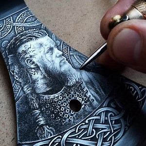 2.4M views · 16K reactions | Hand Engraving And Etching Axe Head Into A Viking Axe | DIY & Crafts | Facebook