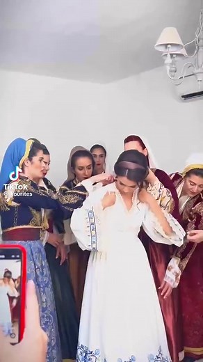 WHEN GREEKS MARTY SERIES #2 part 1 Crete: The dressing of the bride in full traditional costumes for all. credit: @kourites | HELLENE AND PROUD
