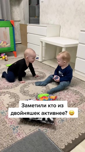 Adorable Twins Playing at Home with Their Cat