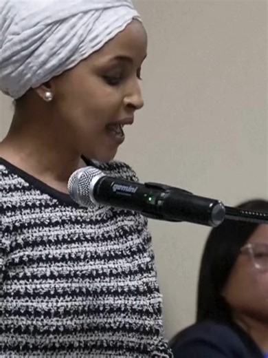 A man wearing a black jacket was tackled to the ground after spraying an unknown substance on U.S. Rep. Ilhan Omar at a town hall she was hosting in Minneapolis on Tuesday. The audience cheered as he was pinned down and his arms were tied behind his back. In video of the incident, someone in the crowd can be heard saying, “Oh my god, he sprayed something on her.” Omar continued the town hall after the man was ushered out of the room. #ilhanomar #minneapolis #immigration
