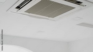 Ceiling mounted air conditioning cassette type unit with modern design and sleek appearance.