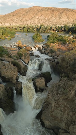 Waterfalls, river breezes, and your next adventure - all in one place. Omarunga Epupa Falls Camp is calling! Who’s ready to answer?: https://hubs.la/Q03QblG40 #gondwanalodges #namibia #roadtrip #travelnamibia | Gondwana Collection Namibia