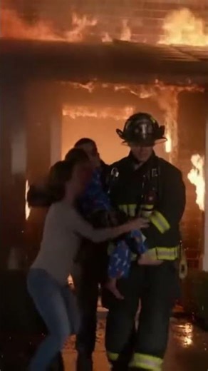 The heroic act of a firefighter saving a family from burning building!