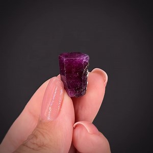 Corundum var. Ruby - Mogok Township, Pyin-Oo-Lwin Dist., Mandalay Region, Myanmar (Burma) More info: https://www.irocks.com/minerals/specimen/53051 This is a single, superb, perfectly-formed crystal of ruby. It has unusually fine geometry and form for a Burmese ruby crystal, as many are stretched out, deformed, elongated, etc, etc. Sharp columnar crystals like this are uncommon. An old piece, purchased by Jack Halpern back in the 1990s. Jack collected by color and beauty, regardless of size. Peo