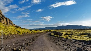 Moss-covered lava fields and track time lapse in Iceland