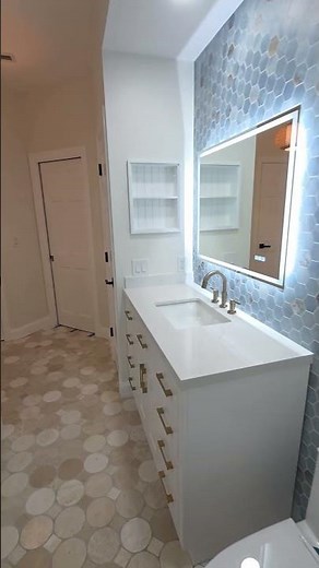 Open Concept Master Bathroom Layout with Curbless Walk-In Shower and Stone Tile
