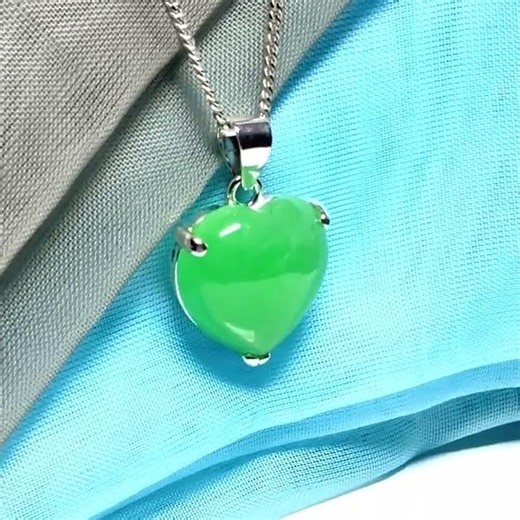A real green jade necklace heart shaped sterling silver with chain