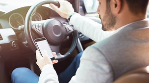 Should Mobile Phone Driving Laws be Tightened?