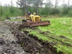 Caterpillar D6B plowing