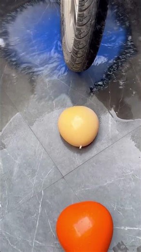 Slow motion explosion of color balloons with bike tyre 🎉 #shorts #viral #asmr #asmrsounds