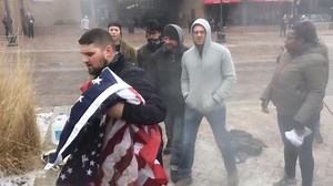FedEx driver breaks up flag burning protest