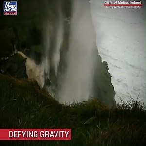 WAYWARD WATERFALLS: Strong winds at the Cliffs of Moher in Ireland appeared to reverse the flow of water on a waterfall. | Fox News