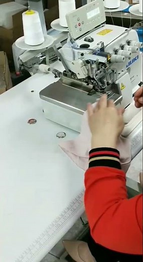 JUKI brand overlock sewing machine with REDSUN trimming system