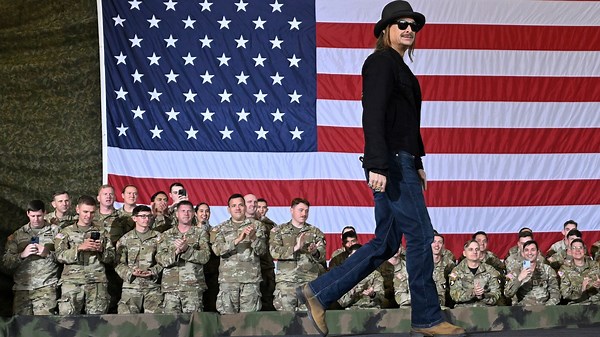 Army reviewing after helicopters hovered alongside Kid Rock's swimming pool as he saluted