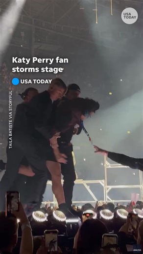 1.9M views · 1.1K reactions | A Katy Perry fan ran on stage during the popstar's hit song, "Hot N Cold." Security guards removed the overzealous fan at Perry's concert in Sydney. | USA TODAY | Facebook
