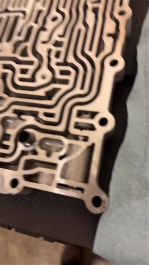 Vacuum checking on a 6L80 valve body today. Found a worn actuator feed limit valve, and a worn TCC regulator valve. Got it all fixed up with some drop in valves from #Sonnax and it’s ready to go now. | Johnson Transmission Service