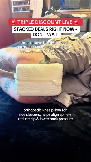 This deal is about to disappear and I’m telling you right now… go check the cart total before it’s gone 👀 I’m not even joking, the way the sale coupons stack on this right now is wild and you won’t see the real price unless you actually click into the cart and apply them This is an orthopedic knee pillow made for side sleepers that keeps your spine aligned while you sleep so your body isn’t twisting all night. It helps take pressure off your hips, lower back, and knees which is why so many peop