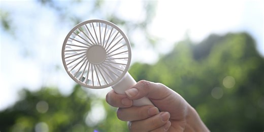 Temperatures Are Heating Up on the East Coast—These Handheld Fans Can Help You Stay Cool