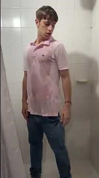 Wet guy with pink polo shirt and jeans