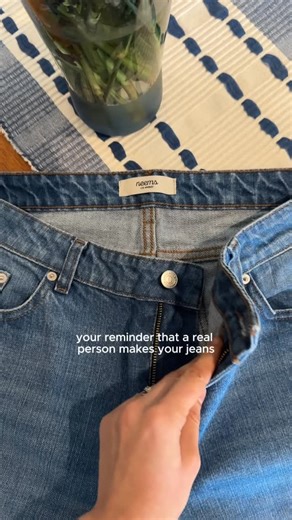 Neems | Custom Made Jeans on Instagram: "We put something inside our jeans that most brands don’t - WHO made your custom jeans. It sounds simple, but think about it: how many pieces of clothing do you own? Now ask yourself - do you know who made any of them? We’ve been taught to think of clothing as coming from nowhere. A factory. A country. A machine. But there’s ALWAYS a person involved. Someone sews it. Someone sits at a machine and puts it together with their hands. We think you should know 