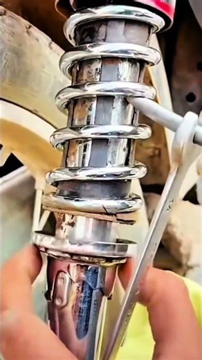 Spring coil rusted hand steadies silence