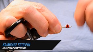 Kamikaze Sculpin Recipe Hook: #4 Tiemco 5263. Dumbbells: Large red Pseudo Eyes. Thread: Gray 3/0 Monocord or 6/0 Uni-Thread. Flash: Pearl Angel Hair. Tail/Wing: Black-barred rabbit strip. Belly: Silver Minnow Arizona Simi Seal dubbing. Collar: Natural mallard flank. Head: Rabbit fur dubbing loop. Full tutorial here: https://bit.ly/3NaXcRX The Kamikaze Sculpin is Matt Winkler’s answer to the modern tendency to overbuild streamers. Instead of piling on materials, he leans into thoughtful restraint